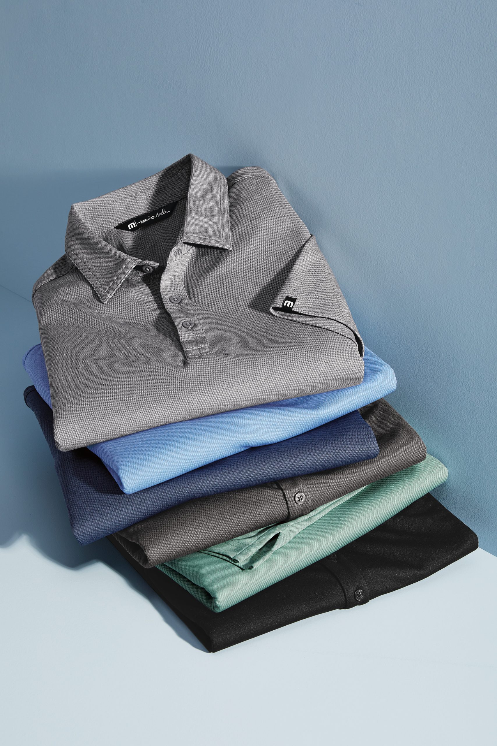 TravisMathew Coto Performance Polo with Embroidered Dem-Con logo - Image 12